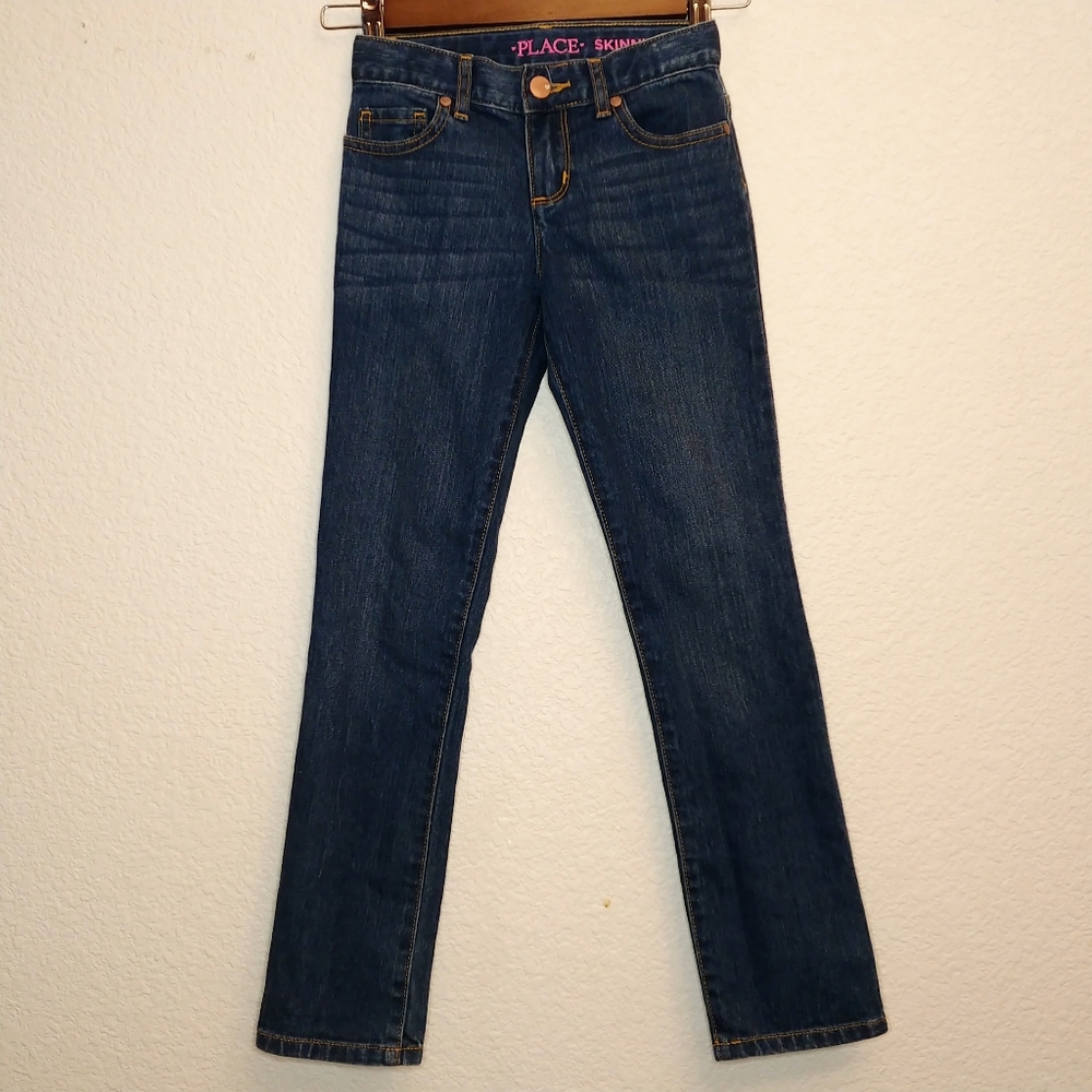 Place skinny jeans